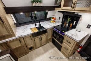 2026 Forest River Cherokee Grey Wolf 27GH Front Kitchen Travel Trailer Interior Image