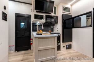 2026 Forest River Rogue Armored 32L132 Toy Hauler Travel Trailer Interior Image