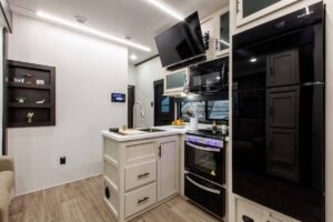 2027 Forest River Rogue Armored 32L132 Toy Hauler Travel Trailer Interior Image