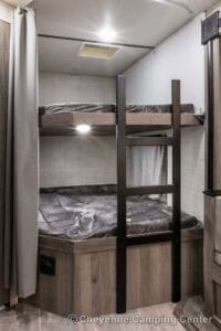 2021 Gulf Stream Enlighten 27BHS Used Bunkhouse Travel Trailer Interior Image