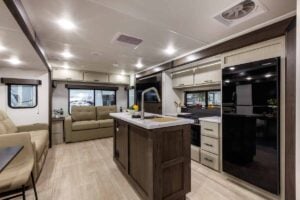 2027 Forest River Cherokee Alpha Wolf 28RLX Rear Living Room Couples Travel Trailer Interior Image