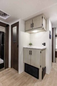 2027 Forest River Cherokee Alpha Wolf 28RLX Rear Living Room Couples Travel Trailer Interior Image