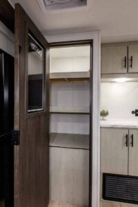 2027 Forest River Cherokee Alpha Wolf 28RLX Rear Living Room Couples Travel Trailer Interior Image