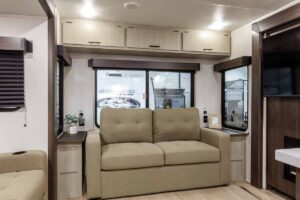 2027 Forest River Cherokee Alpha Wolf 28RLX Rear Living Room Couples Travel Trailer Interior Image