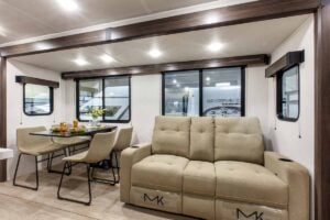 2027 Forest River Cherokee Alpha Wolf 28RLX Rear Living Room Couples Travel Trailer Interior Image