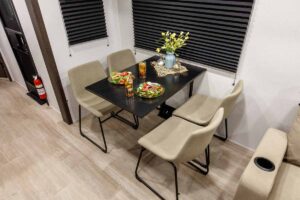2027 Forest River Cherokee Alpha Wolf 28RLX Rear Living Room Couples Travel Trailer Interior Image