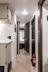 2027 Forest River Cherokee Alpha Wolf 28RLX Rear Living Room Couples Travel Trailer Interior Image