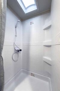 2027 Forest River Cherokee Alpha Wolf 28RLX Rear Living Room Couples Travel Trailer Interior Image