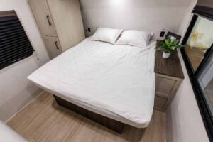 2027 Forest River Cherokee Alpha Wolf 28RLX Rear Living Room Couples Travel Trailer Interior Image