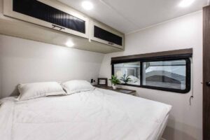 2027 Forest River Cherokee Alpha Wolf 28RLX Rear Living Room Couples Travel Trailer Interior Image
