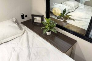 2027 Forest River Cherokee Alpha Wolf 28RLX Rear Living Room Couples Travel Trailer Interior Image
