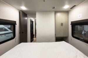 2027 Forest River Cherokee Alpha Wolf 28RLX Rear Living Room Couples Travel Trailer Interior Image